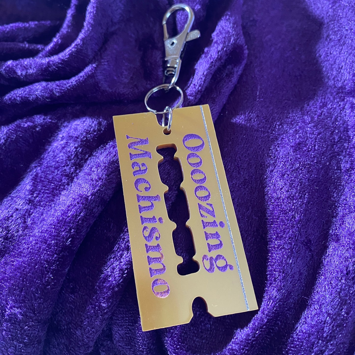 Oooozing Machismo Razorblade Keychain